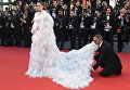 Актриса Арая Альберта Харгейт на красной дорожке церемонии открытия 70-го Каннского международного кинофестиваля Актриса Арая Альберта Харгейт на красной дорожке церемонии открытия 70-го Каннского международного кинофестиваля