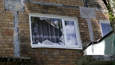 Последствия обстрела в Куйбышевском районе Донецка. Архивное фото Последствия обстрела в Куйбышевском районе Донецка. Архивное фото
