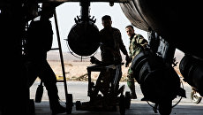 Военнослужащие сирийской армии готовят к вылету самолет СУ-22 на базе Военно-воздушных сил Сирии в провинции Хомс Военнослужащие сирийской армии готовят к вылету самолет СУ-22 на базе Военно-воздушных сил Сирии в провинции Хомс