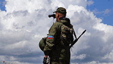 Военнослужащий Народной милиции ЛНР на позициях у линии соприкосновения в Донбассе Военнослужащий Народной милиции ЛНР на позициях у линии соприкосновения в Донбассе