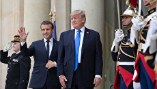 Дональд Трамп и Эммануэль Макрон во время встречи в Париже. 13 июля 2017 Дональд Трамп и Эммануэль Макрон во время встречи в Париже. 13 июля 2017