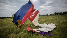 Обломки лайнера Boeing 777 Малайзийских авиалиний. Архивное фото Обломки лайнера Boeing 777 Малайзийских авиалиний. Архивное фото