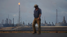 Нефтеперерабатывающий комплекс Амуай в Пунто Фиджо, принадлежащий венесуэльской государственной нефтяной компании PDVSA. Архивное фото Нефтеперерабатывающий комплекс Амуай в Пунто Фиджо, принадлежащий венесуэльской государственной нефтяной компании PDVSA. Архивное фото