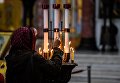 Свечи верующих в Морском Никольском соборе в Кронштадте Свечи верующих в Морском Никольском соборе в Кронштадте