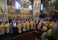 Богослужение в Успенском соборе Московского Кремля в День крещения Руси Богослужение в Успенском соборе Московского Кремля в День крещения Руси