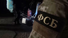Сотрудники ФСБ. Архивное фото Сотрудники ФСБ. Архивное фото