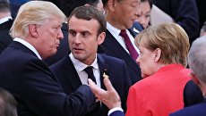 Президент США Дональд Трамп, президент Франции Эммануэль Макрон и федеральный канцлер Германии Ангела Меркель. Архивное фото Президент США Дональд Трамп, президент Франции Эммануэль Макрон и федеральный канцлер Германии Ангела Меркель. Архивное фото
