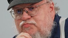 Американский писатель-фантаст Джордж Рэймонд Ричард Мартин на пресс-конференции в Санкт-Петербурге. 16 августа 2017 Американский писатель-фантаст Джордж Рэймонд Ричард Мартин на пресс-конференции в Санкт-Петербурге. 16 августа 2017