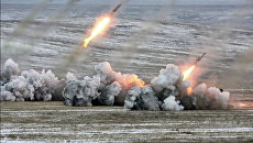 Стрельба из систем залпового огня ТОС-1А. Архивное фото Стрельба из систем залпового огня ТОС-1А. Архивное фото