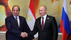 Владимир Путин и Абдель-Фаттах ас-Сиси. Архивное фото Владимир Путин и Абдель-Фаттах ас-Сиси. Архивное фото
