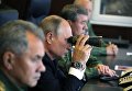 Президент РФ Владимир Путин во время инспекции действий вооружённых сил Союзного государства России и Белоруссии на основном этапе совместного стратегического учения Запад-2017 на полигоне Лужский Президент РФ Владимир Путин во время инспекции действий вооружённых сил Союзного государства России и Белоруссии на основном этапе совместного стратегического учения Запад-2017 на полигоне Лужский