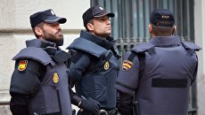 Сотрудники полиции в Барселоне. Архивное фото Сотрудники полиции в Барселоне. Архивное фото