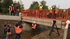 Первый напечатанный на 3D-принтере мост для велосипедистов открыли в городе Гемерт на юге Нидерландов Первый напечатанный на 3D-принтере мост для велосипедистов открыли в городе Гемерт на юге Нидерландов