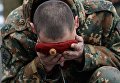 Военнослужащий национальной гвардии РФ во время церемонии вручения краповых беретов в Новосибирской области Военнослужащий национальной гвардии РФ во время церемонии вручения краповых беретов в Новосибирской области