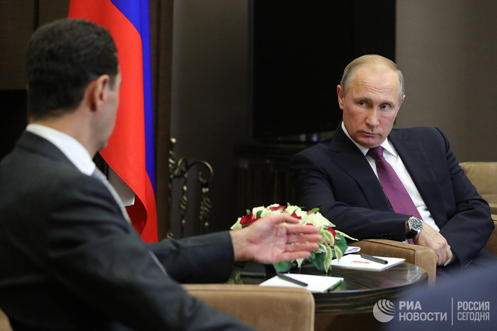 Президент РФ Владимир Путин и президент Сирии Башар Асад во время встречи Президент РФ Владимир Путин и президент Сирии Башар Асад во время встречи