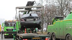Эвакуация автомобиля, участвовашего в столкновении пассажирского автобуса с остановкой на Сходненской улице в Москве. 29 декабря 2017 Эвакуация автомобиля, участвовашего в столкновении пассажирского автобуса с остановкой на Сходненской улице в Москве. 29 декабря 2017