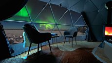 Иглу в селе Aurora village в Мурманской области. Архивное фото Иглу в селе Aurora village в Мурманской области. Архивное фото