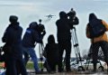 Журналисты наблюдают за посадкой на автотрассу в Ростовской области истребителя-бомбардировщика Су-34 в ходе летно-тактических учений 4-й армии ВВС и ПВО Южного военного округа Журналисты наблюдают за посадкой на автотрассу в Ростовской области истребителя-бомбардировщика Су-34 в ходе летно-тактических учений 4-й армии ВВС и ПВО Южного военного округа
