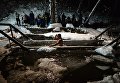 Верующие купаются в купели во время традиционного праздничного купания в Крещенский сочельник на источнике Святой ключ в Искитимском районе Новосибирской области Верующие купаются в купели во время традиционного праздничного купания в Крещенский сочельник на источнике Святой ключ в Искитимском районе Новосибирской области