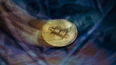 Криптовалюта биткоин. Архивное фото Криптовалюта биткоин. Архивное фото