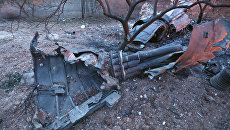Обломки сбитого боевиками российского самолета Су-25 в Сирии. 3 февраля 2018 Обломки сбитого боевиками российского самолета Су-25 в Сирии. 3 февраля 2018