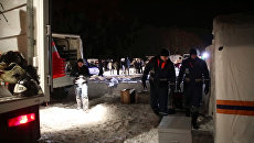 Сотрудники МЧС России в Раменском районе Московской области, где самолет Ан-148 Саратовских авиалиний рейса 703 Москва-Орск потерпел крушение 11 февраля 2018 года Сотрудники МЧС России в Раменском районе Московской области, где самолет Ан-148 Саратовских авиалиний рейса 703 Москва-Орск потерпел крушение 11 февраля 2018 года