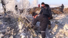 Сотрудники МЧС России на месте падения Ан-148 в Раменском районе Московской области. архивное фото Сотрудники МЧС России на месте падения Ан-148 в Раменском районе Московской области. архивное фото