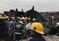 Спасатели на месте крушения самолета авиакомпании US-Bangla Airlines в Катманду, Непал. 12 марта 2018 Спасатели на месте крушения самолета авиакомпании US-Bangla Airlines в Катманду, Непал. 12 марта 2018