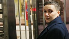 Депутат Верховной рады Украины Надежда Савченко у входа в здание СБУ в Киеве. 15 марта 2018 Депутат Верховной рады Украины Надежда Савченко у входа в здание СБУ в Киеве. 15 марта 2018