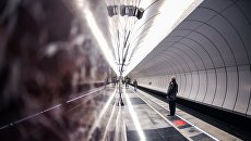 Пассажиры на станции метро Московского метрополитена. Архивное фото Пассажиры на станции метро Московского метрополитена. Архивное фото