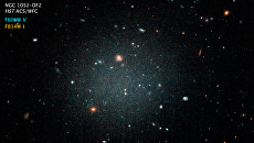 Галактика NGC 1052-DF2 в созвездии Кита, где нет темной материи Галактика NGC 1052-DF2 в созвездии Кита, где нет темной материи