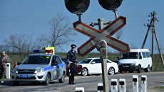 На месте дорожно-транспортного происшествия на железнодорожном переезде под городом Армянск в Крыму. 8 апреля 2018 На месте дорожно-транспортного происшествия на железнодорожном переезде под городом Армянск в Крыму. 8 апреля 2018