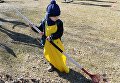 Юный участник общегородского субботника в Парке искусств Музеон Юный участник общегородского субботника в Парке искусств Музеон