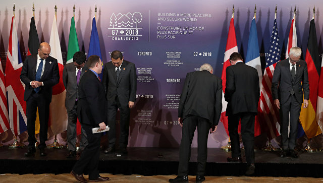 Министры безопасности и министры иностранных дел стран-участниц Большой семерки перед церемонией фотографирования в Торонто, Канада. 23 апреля 2018