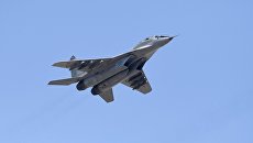 Многоцелевой истребитель МиГ-29СМТ на репетиции воздушной части парада Победы в Москве Многоцелевой истребитель МиГ-29СМТ на репетиции воздушной части парада Победы в Москве