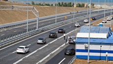 Автомобильное движение по автодорожной части Крымского моста Автомобильное движение по автодорожной части Крымского моста