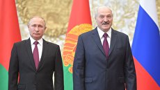 Президент РФ Владимир Путин и президент Белоруссии Александр Лукашенко. Архивное фото Президент РФ Владимир Путин и президент Белоруссии Александр Лукашенко. Архивное фото