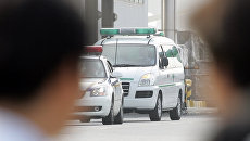Полиция и скорая помощь в Южной Корее. Архивное фото Полиция и скорая помощь в Южной Корее. Архивное фото