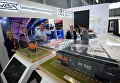 Участники у стенда корпорации Уралвагонзавод на Международной промышленной выставке Иннопром - 2018 в международном выставочном центре Екатеринбург-ЭКСПО Участники у стенда корпорации Уралвагонзавод на Международной промышленной выставке Иннопром - 2018 в международном выставочном центре Екатеринбург-ЭКСПО