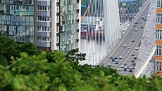 Вид с сопки Орлиное гнездо на вантовый мост через бухту Золотой Рог во Владивостоке. Архивное фото Вид с сопки Орлиное гнездо на вантовый мост через бухту Золотой Рог во Владивостоке. Архивное фото