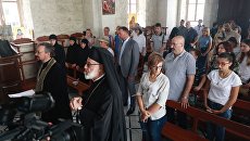 Семьи погибших в Сирии офицеров России вместе с представителями всероссийской организации ветеранов «Боевое братство» в монастыре святой Феклы в сирийской Маалюле Семьи погибших в Сирии офицеров России вместе с представителями всероссийской организации ветеранов «Боевое братство» в монастыре святой Феклы в сирийской Маалюле