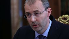 Губернатор Чукотского автономного округа Роман Копин во время встречи с президентом РФ Владимиром Путиным. 1 августа 2018 Губернатор Чукотского автономного округа Роман Копин во время встречи с президентом РФ Владимиром Путиным. 1 августа 2018