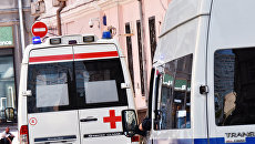 Автомобили скорой помощи и полиции. Архивное фото Автомобили скорой помощи и полиции. Архивное фото