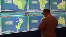 Работа информационного центра ЦИК РФ. Архивное фото Работа информационного центра ЦИК РФ. Архивное фото