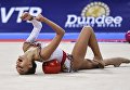 Дина Аверина (Россия) выполняет упражнения с мячом в индивидуальной программе на чемпионате мира по художественной гимнастике 2018 в Софии Дина Аверина (Россия) выполняет упражнения с мячом в индивидуальной программе на чемпионате мира по художественной гимнастике 2018 в Софии