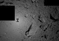 Тень зонда Хаябуса-2 на астероиде Рюгу Тень зонда Хаябуса-2 на астероиде Рюгу