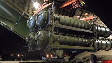 Выгрузка зенитно-ракетных комплексов С-300 в Сирии. Архивное фото Выгрузка зенитно-ракетных комплексов С-300 в Сирии. Архивное фото