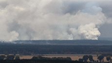 Дым от взрывов на складе с боеприпасами в районе населенного пункта Ичня Черниговской области, Украина. 9 октября 2018 Дым от взрывов на складе с боеприпасами в районе населенного пункта Ичня Черниговской области, Украина. 9 октября 2018