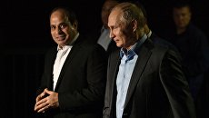 Владимир Путин и президент Арабской Республики Египет Абдель Фаттах ас-Сиси во время прогулки на набережной Олимпийского парка в Сочи. 16 октября 2018 Владимир Путин и президент Арабской Республики Египет Абдель Фаттах ас-Сиси во время прогулки на набережной Олимпийского парка в Сочи. 16 октября 2018