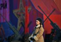 Участница марша, посвященного 77-летию военного парада 1941 года, на Красной площади в Москве Участница марша, посвященного 77-летию военного парада 1941 года, на Красной площади в Москве